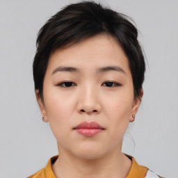 Neutral asian young-adult female with short  brown hair and brown eyes