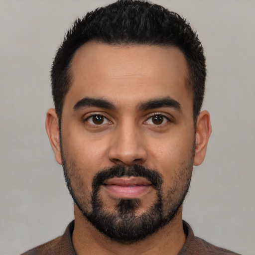 Neutral latino young-adult male with short  black hair and brown eyes