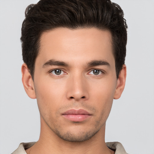 Neutral white young-adult male with short  brown hair and brown eyes