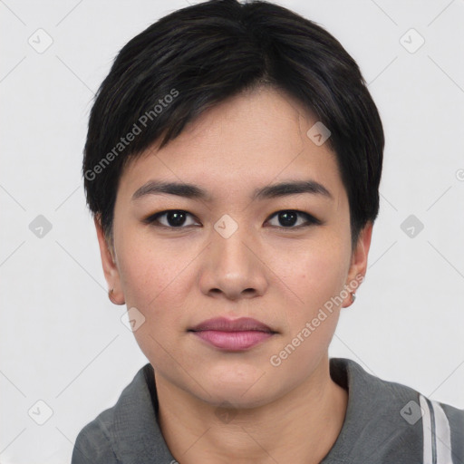 Joyful asian young-adult female with short  black hair and brown eyes