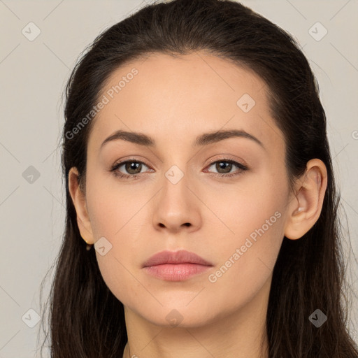 Neutral white young-adult female with long  brown hair and brown eyes