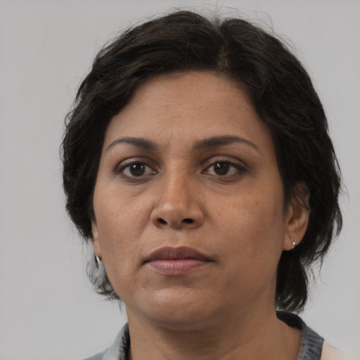Neutral white adult female with medium  brown hair and brown eyes