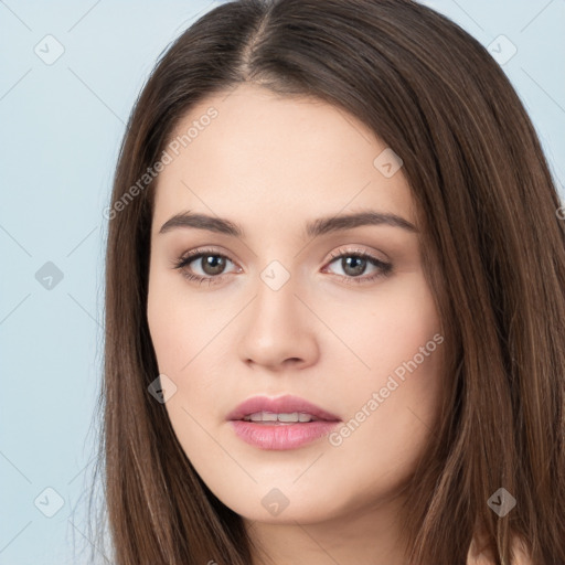 Neutral white young-adult female with long  brown hair and brown eyes