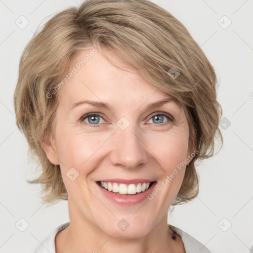 Joyful white young-adult female with medium  brown hair and blue eyes