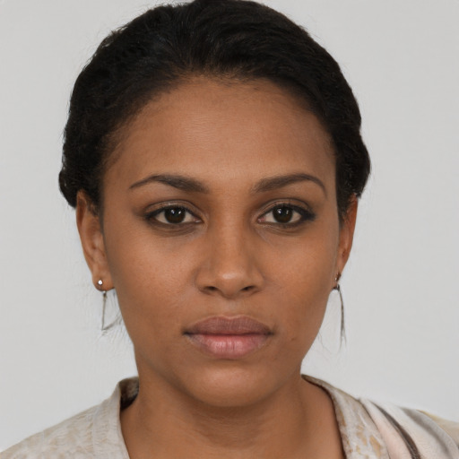 Neutral white young-adult female with short  black hair and brown eyes