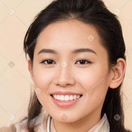 Joyful white young-adult female with long  brown hair and brown eyes