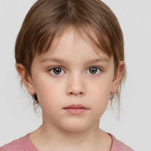 Neutral white child female with medium  brown hair and grey eyes