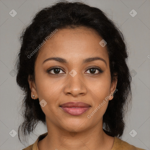 Joyful black young-adult female with medium  brown hair and brown eyes