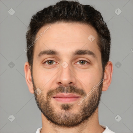 Joyful white young-adult male with short  brown hair and brown eyes