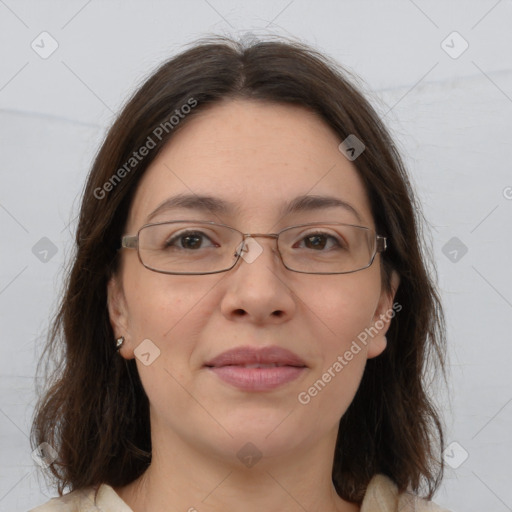 Joyful white adult female with medium  brown hair and brown eyes