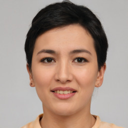 Joyful asian young-adult female with short  brown hair and brown eyes