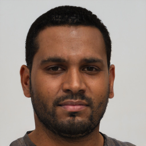 Neutral black young-adult male with short  black hair and brown eyes
