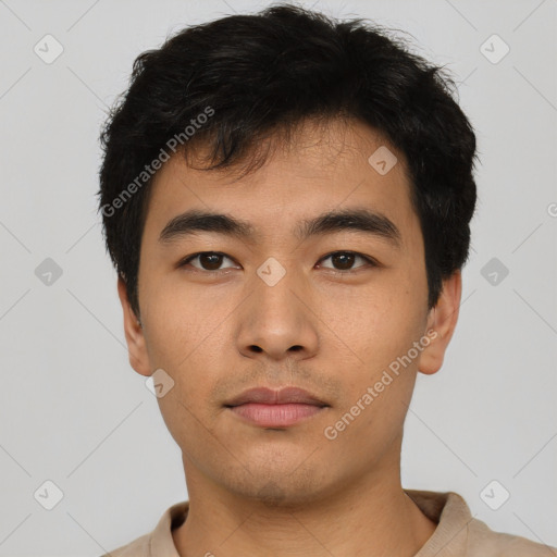 Neutral asian young-adult male with short  black hair and brown eyes