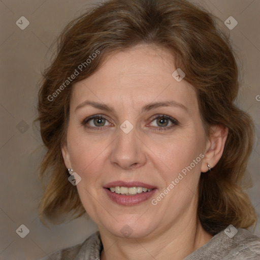 Joyful white adult female with medium  brown hair and brown eyes