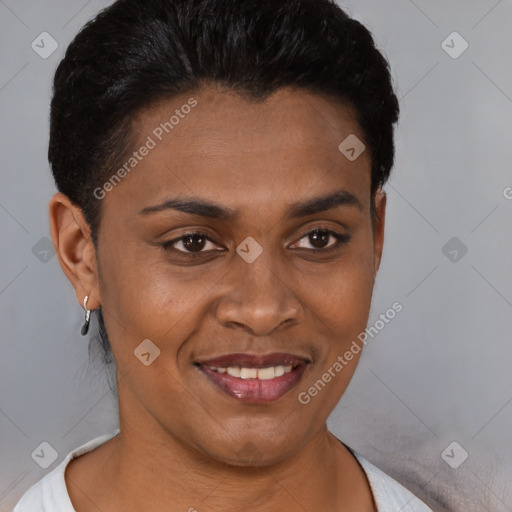 Joyful black young-adult female with short  brown hair and brown eyes