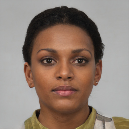 Neutral black young-adult female with short  brown hair and brown eyes