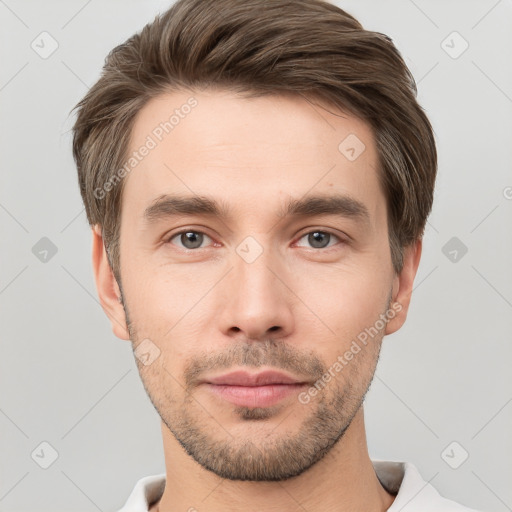 Neutral white young-adult male with short  brown hair and brown eyes