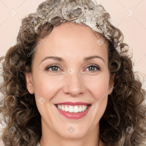 Joyful white young-adult female with medium  brown hair and green eyes