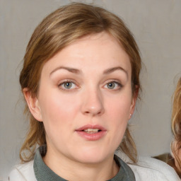 Neutral white young-adult female with medium  brown hair and blue eyes