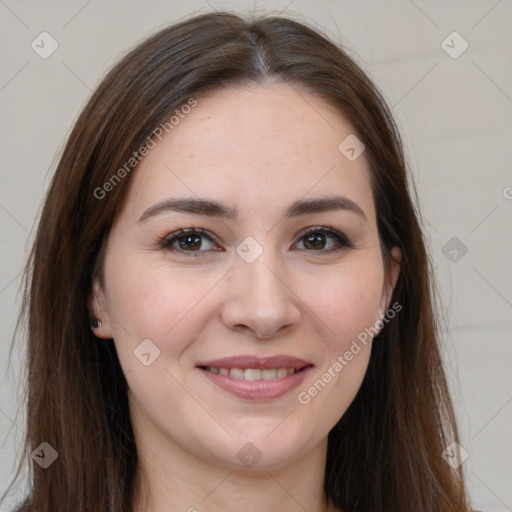 Joyful white young-adult female with long  brown hair and brown eyes