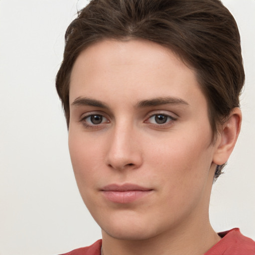 Neutral white young-adult female with short  brown hair and brown eyes