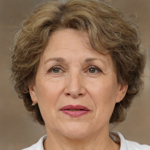 Joyful white middle-aged female with medium  brown hair and brown eyes