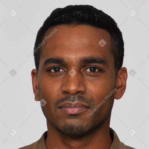 Neutral latino young-adult male with short  black hair and brown eyes