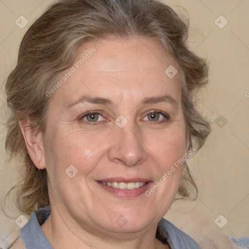 Joyful white middle-aged female with medium  brown hair and brown eyes