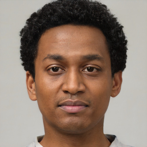 Neutral black young-adult male with short  brown hair and brown eyes