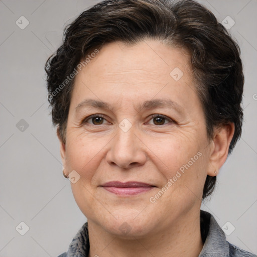 Joyful white adult female with short  brown hair and brown eyes