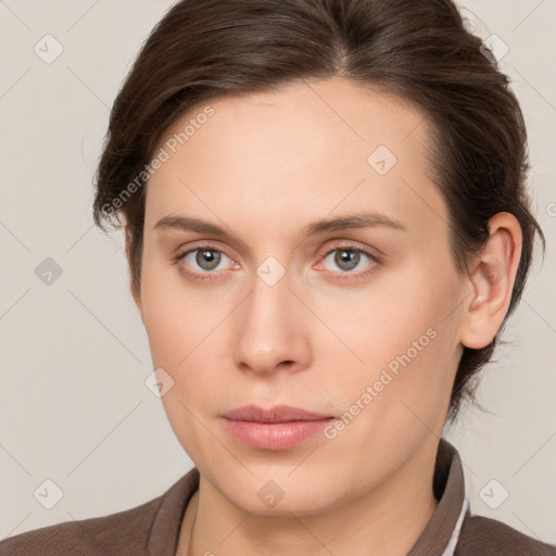 Neutral white young-adult female with medium  brown hair and grey eyes