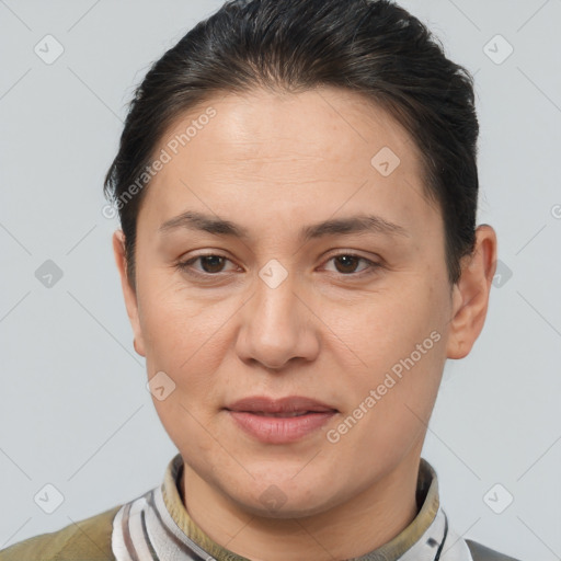 Joyful white adult female with short  brown hair and brown eyes