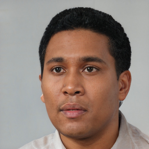 Neutral black young-adult male with short  black hair and brown eyes