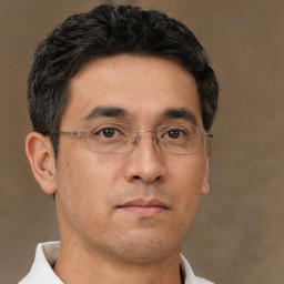 Neutral white adult male with short  brown hair and brown eyes