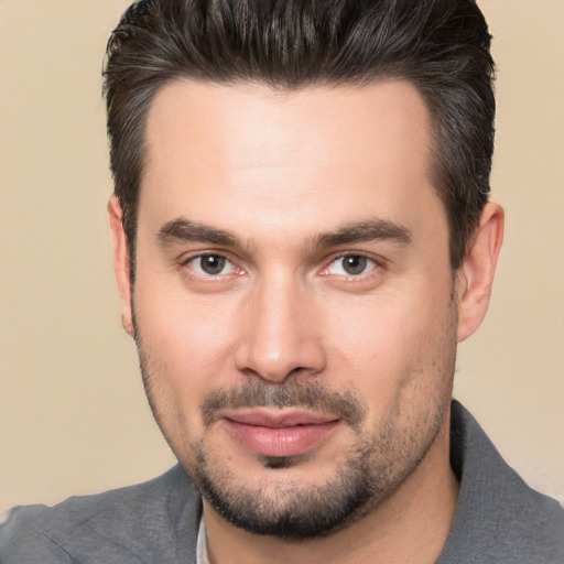 Joyful white young-adult male with short  brown hair and brown eyes