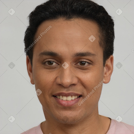 Joyful latino young-adult male with short  black hair and brown eyes