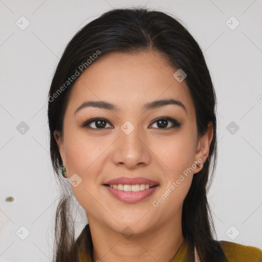 Joyful asian young-adult female with long  brown hair and brown eyes