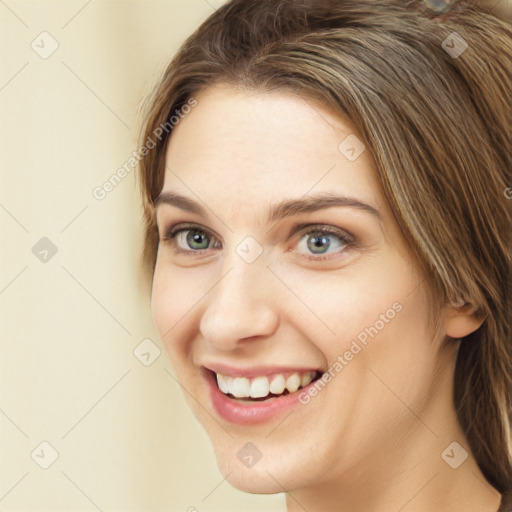 Joyful white young-adult female with long  brown hair and green eyes