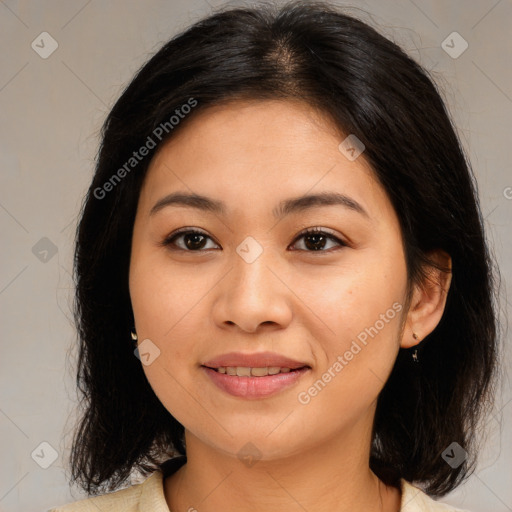 Joyful asian young-adult female with medium  brown hair and brown eyes