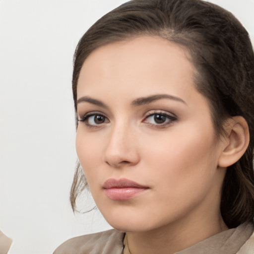 Neutral white young-adult female with medium  brown hair and brown eyes