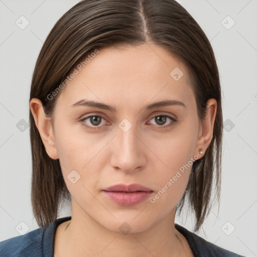 Neutral white young-adult female with medium  brown hair and grey eyes