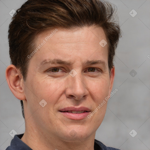 Joyful white adult male with short  brown hair and grey eyes