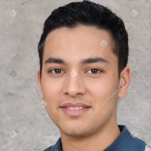 Joyful white young-adult male with short  black hair and brown eyes