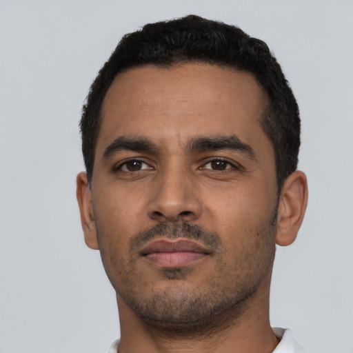 Neutral latino young-adult male with short  black hair and brown eyes