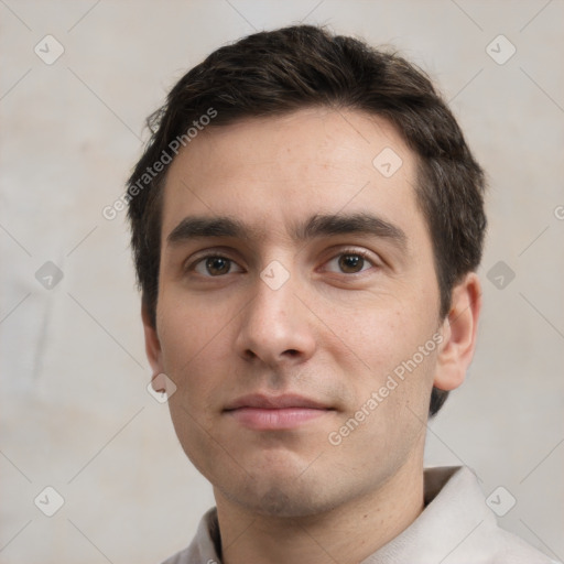 Neutral white young-adult male with short  brown hair and brown eyes