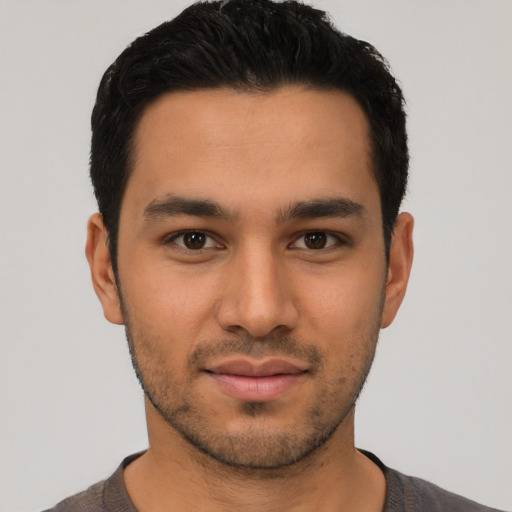 Neutral latino young-adult male with short  black hair and brown eyes