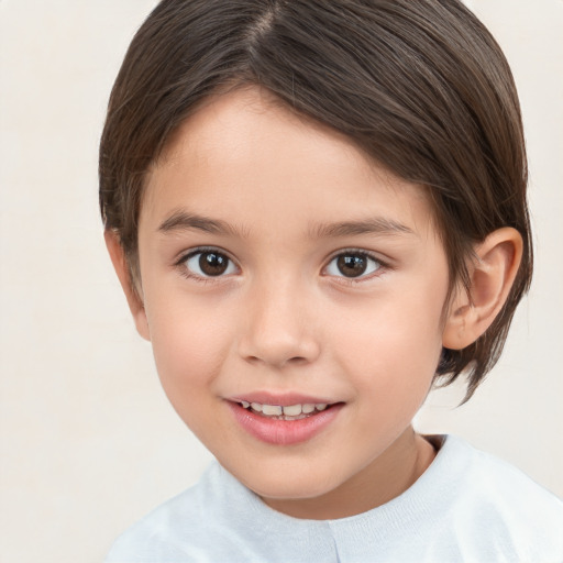 Joyful white child female with medium  brown hair and brown eyes