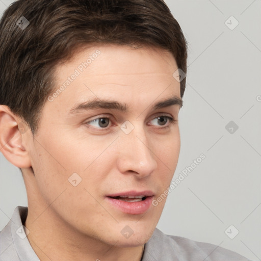 Neutral white young-adult male with short  brown hair and brown eyes