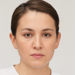 Neutral white young-adult female with short  brown hair and brown eyes