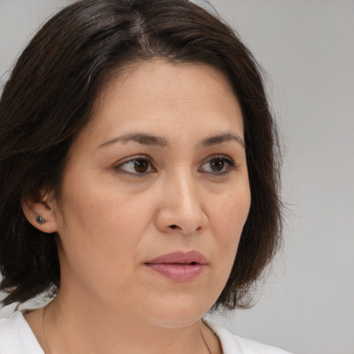 Neutral white adult female with medium  brown hair and brown eyes